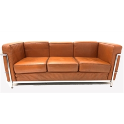 After Le Corbusier - Mid 20th century three seat sofa with chrome frame and brown leather upholstered arm rests and loose cushions, W177cm, H68cm, D70cm