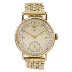 International Watch Company gentleman's 9ct gold manual wristwatch, champagne/cream dial with subsidereary seconds dial, London import mark 1937, on 9ct gold strap with fold-over expanding clasp