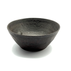 Dame Lucie Rie DBE (1902-1995) a small stoneware bowl with manganese glaze, impressed seal mark D8.5cm