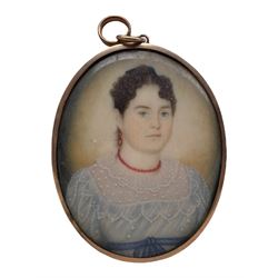 19th century miniature oval head and shoulders portrait on ivory of a lady wearing a coral bead necklace 6cm x 4.5cm