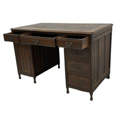 Late Victorian mahogany kneehole desk, rectangular top with canted corners and moulded edge with inset writing surface, fitted with five graduating drawers and single cupboard