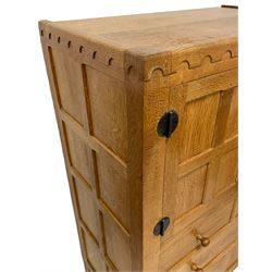 Mouseman - oak tallboy chest, fitted with two cupboards above two short and two long drawers, carved Mouse signature, by the workshop of Robert Thompson, Kilburn