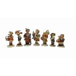 Four Hummel figures together with three similar Friedel figures, max H16cm (7)