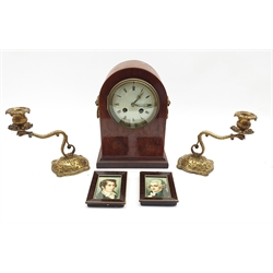 Edwardian inlaid mahogany dome top mantle clock, twin train movement, pair of 19th century gilt brass candlesticks with serpent support and a pair of miniature simulated rosewood frames, 10.5cm x 8cm 