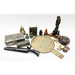Japanese bronzed hand mirror, Japanese Tsuba mounted on hardwood stand, a Japanese netsuke, Japanese metal guards, a knife in lacquered case, three Japanese antimony boxes and miscellanea 