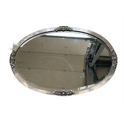 Early 20th century steel framed oval wall mirror 