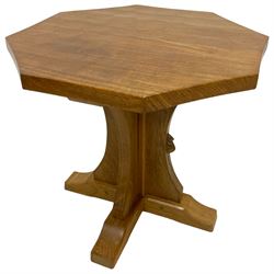 Mouseman - oak coffee table, adzed octagonal top on cruciform base and sledge feet, carved with mouse signature, by the workshop of Robert Thompson, Kilburn