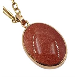 9ct rose gold oval goldstone and black onyx pendant necklace by David Scott Walker, Sheffield 1985, on 9ct gold fancy link chain, hallmarked
