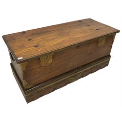 19th century European hardwood chest or coffer, rectangular hinged top enclosing candle box, bound with pierced brass fretwork fittings, the plinth base carved and painted with central butterfly motif