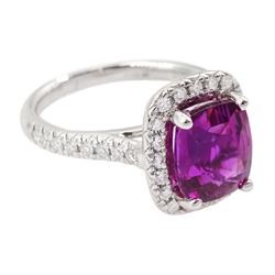 18ct white gold cushion cut pink sapphire and round brilliant cut diamond cluster ring, with diamond set shoulders, hallmarked, sapphire approx 3.10 carat