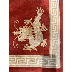 Persian style red ground rug, with repeating gul motif and guarded border, (155cm x 100cm) a Turkish style rug  (157cm x 84cm) and a Red Chinese rug (170cm x 77cm)
