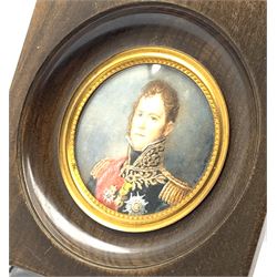 Lucienne Frison-Fabrice (French 1889-1960), Circular miniature head and shoulders portrait of a French official, signed, the frame with gilt metal slip D7cm 