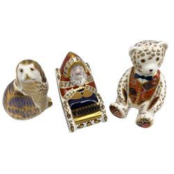 Three Royal Crown Derby paperweights comprising Santa & Sleigh, Red Tie Teddy Bear and King Charles Spaniel (3)