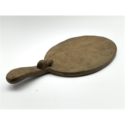 Thompson of Kilburn Mouseman oak oval cheese board, the raised handle with a carved mouse signature L38cm overall