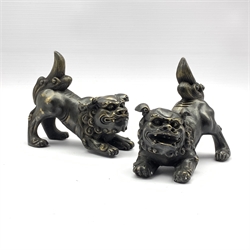 Pair of bronze figures of Chinese lions 14cm x 17cm