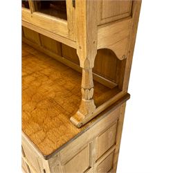 Wrenman - oak dresser, projecting lapit carved cornice, raised display cabinets flanking open centre shelves with acorn and oak leaf carved brackets, rectangular adzed top over three drawers and two panelled cupboards, carved proud wren signature, by Robert (Bob) Hunter of Thirlby