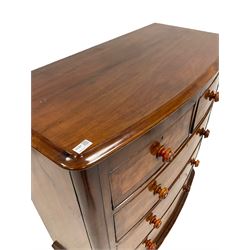 Victorian mahogany chest of drawers, the bow front fitted with two short and three long drawers, raised on turned supports 