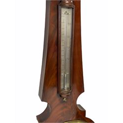 A mid-Victorian four dial mercury wheel barometer in a mahogany veneered case, Swan-neck pediment and moulded square base, recessed hygrometer with a circular silvered dial engraved “dry” “damp” with a brass bezel and flat glass, removable bow-fronted thermometer box with convex glass, mercury thermometer tube, recording from nought to one hundred and ten degrees fahrenheit on an engraved silver scale, brass thermometer bolt, twelve-inch silvered register engraved with weather predictions in Roman upper and lower case and Gothic script, barometric air pressure from twenty eight to thirty one inches in hundredths of an inch, richly engraved dial center, steel indicator hand and brass recording hand, with a cast brass bezel and concave glass, hand setting knob, level bubble recessed within an oblong frame and silvered plate engraved “John Vincent” “Weymouth”.
John Vincent are recorded as a family firm of Jewellers, watchmakers and silversmiths trading from 74 and later 86 St Mary Street, Weymouth, from  1801-1914. Twelve-inch barometers were the largest size of domestic barometer produced.
