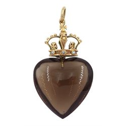 Early 20th century heart shaped smokey quartz, suspending from 10ct gold seed pearl crown pendant