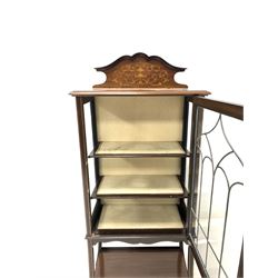 Edwardian inlaid mahogany display cabinet, single door enclosing two shelves, raised on splayed supports 