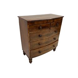 Late 19th mahogany bow front chest, fitted with two short and three long drawers, turned pull handles, raised on turned supports 