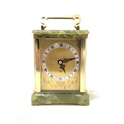 An 'Elliott' early 20th century brass and onyx carriage time piece clock, engraved brass dial with silvered Roman chapter ring, W13cm