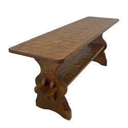 'Gnomeman' oak coffee table, the adzed top over one adzed under-tier, raised on shaped end supports, carved with gnome signature, by Thomas Whittaker of Littlebeck