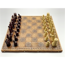  Leather chess board and set of composition chess pieces modelled as figures from the battle of Waterloo 46cm  
