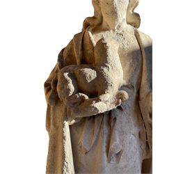 19th century weathered carved sandstone figure of Jesus Christ depicted as the Good Shepherd, draped in robes and holding a lamb, on a naturalistic base