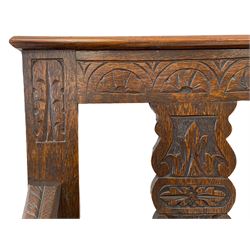 Late 19th century oak hall bench, the cresting rail carved with lunettes and supported by three carved shaped splats, rectangular moulded seat over shaped apron carved with scrolled foliage, on turned supports 