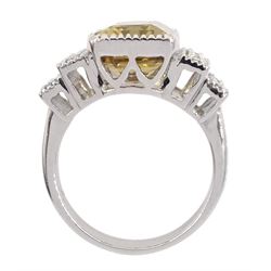 18ct white gold emerald cut tourmaline and round brilliant cut diamond, stepped design ring, stamped 750, tourmaline 6.25 carat, total diamond weight 0.39 carat, with World Gemological Institute report