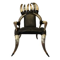 Early to mid-20th century horn armchair, bound in leather, with matching footstool
