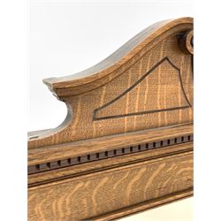 Edwardian oak overmantle mirror, the swan neck pediment centred by shield, over rectangular plate, the frame decorated with carved 'C' scroll and acanthus leaf 110cm x 80cm