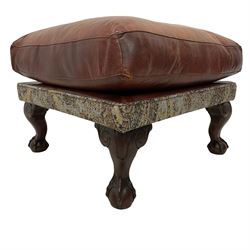 Square footstool, upholstered in part paisley patterned fabric part tan leather with leather piping, hardwood framed, on ball and claw carved feet