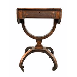 Regency rosewood work table, the hinged top lifting to reveal storage compartment with divisions, drop leaf with canted corners to each end, raised on a platform base with a hooped stretcher leading to four inverted splayed supports terminating in castors, with boxwood string inlay all over W47cm