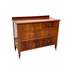 Edwardian mahogany chest, fitted with two short and two long graduated drawers, raised on square tapered supports terminating in castors W107cm