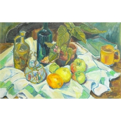 Eunice Giudici (British 1920-1998): 'Green Still Life', oil on board signed and dated 1975, titled and inscribed verso 45cm x 69cm