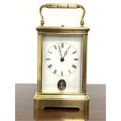 Late 19th century brass repeating carriage clock, white enamel dial with Roman numeral chapter ring, eight day movement striking the hours hammer on coil, W10cm H15cm