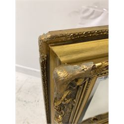 Ornate gilt frame mirror, the projecting frame decorated with foliage surrounding bevelled mirror 78cm x 80cm