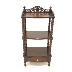 Victorian style mahogany three tier serpentine front what-not, three quarter galleried top with pierced and carved acanthus decoration, rope twist and turned supports, drawer to base 