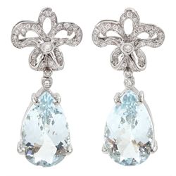 Pair of 18ct white gold pear shaped aquamarine and diamond set bow pendant stud earrings, total aquamarine weight approx 11.60 carat