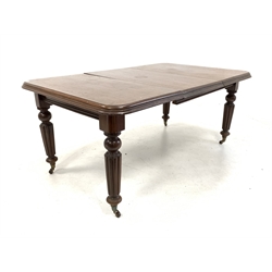 Victorian mahogany wind out extending dining table, rectangular moulded top over turned reeded tapered supports terminating in brass cup and ceramic castors, wind out mechanism with plate for 'Joseph Fitton, Britannia works' and one additional leaf 
