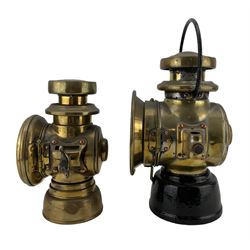 Lucas 'King of the Road' brass lamp, no. F141, and another by Lucas, with black painted swing handle and base, H32cm (2)