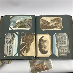 Postcard album containing Edwardian and later examples, many being used with stamps and various cigarette and other trade cards in albums, many being John Players & Sons etc