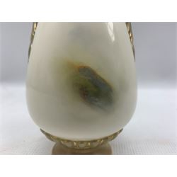 Early 20th century Royal Worcester vase by Harry Davis, of ovoid twin handled form, the body hand painted with sheep against a highland landscape signed H Davis upon a circular gilt moulded foot, with puce printed marks beneath including shape number 2425, and date code for 1908 H21cm