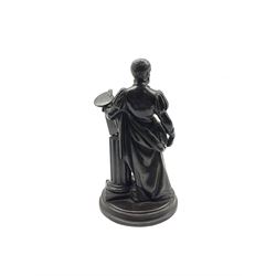 Patinated spelter model of a Scholar, leaning against a column holding a book and paint palette, H20cm  