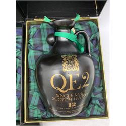 Q.E.2 single malt Scotch whisky, over twelve years old, bottled by Beinn Bhuidhe Holdings for Cunard in black ceramic flagon with wax seal and stopper,  75cl 48.6% Vol, in presentation box, another and a miniature flagon (3)