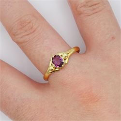 Gold single stone oval pink stone set ring