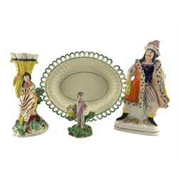 Late 18th/ early 19th century Creamware oval basketweave dish with pierced border, impressed Neale & Co. L25.5cm, early 19th century Pearlware spill vase and Cherub figure, together with a Victorian Staffordshire figure modelled as Edmund Kean as Richard III (4)