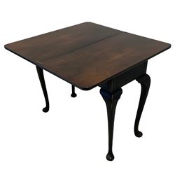 Mid-20th century black and waxed finish walnut tea table, fold-over swivel top with rounded corners revealing walnut surface, fitted with two drawers, on cabriole supports